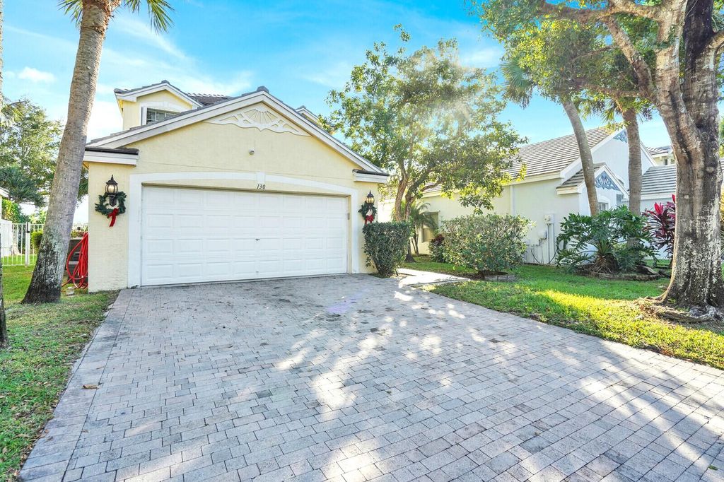 Photo of 130 Canterbury Place, Royal Palm Beach, FL 33414 (MLS # R11145356)