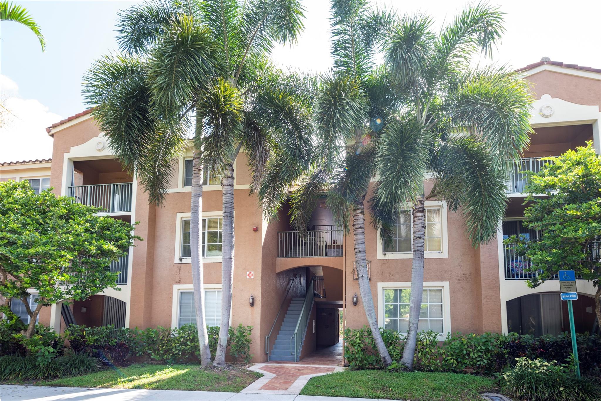 Spacious two bedroom, two bathroom condo that comes with a private GARAGE! Full size washer and dryer in unit. Split bedrooms, each with their own bathroom. Granite counter tops in kitchen, tile and laminate floors, walk in closet in primary, and screened baclony in this second floor unit. Fabulous gated community with clubhouse, updated fitness center, pool, tennis courts and child playroom. Great location close to all: stores, restaurants, highways, and great schools. Minutes from Promenade at Coconut Creek. Association requires 650 credit score. Water included in rent. Professionally managed property.