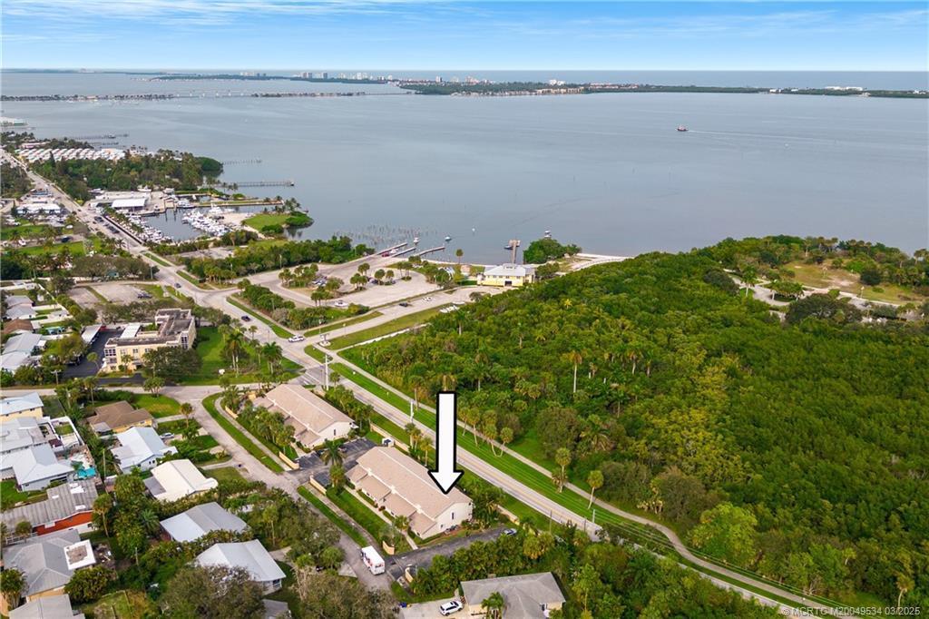 Lovely Remodeled ''Jensen'' Townhouse directly across from the Intracoastal Waterway ! Enjoy the Charming ''Coastal Cottage'' feel of this Beautiful 2 Story Home that has a Master Suite upstairs with an adjacent Office/Loft & Washer/Dryer PLUS a Second Bedroom + Full Bathroom Downstairs! There is a Large Screened Walk-out Patio plus a Second Balcony from the large Master Suite with Private Views & River Breezes. Steps to the Community Swimming Pool, Small Dog Friendly & Assigned Parking too! Minutes to Everywhere - Downtown Jensen, Hutchinson Island Beaches, Indian Riverside Park Plus Shopping & Dining.