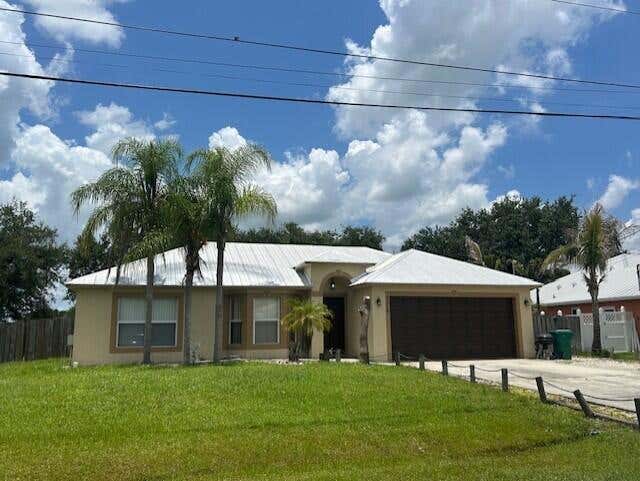 Photo of 5218 NW West Piper Circle, Port Saint Lucie, FL 34986 (MLS # B26046947)