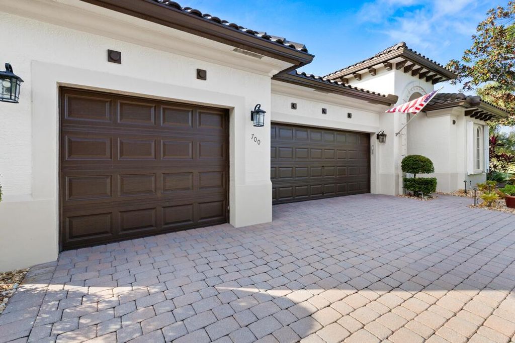 Photo of 700 SW Pebble Lane, Palm City, FL 34990 (MLS # R11140226)