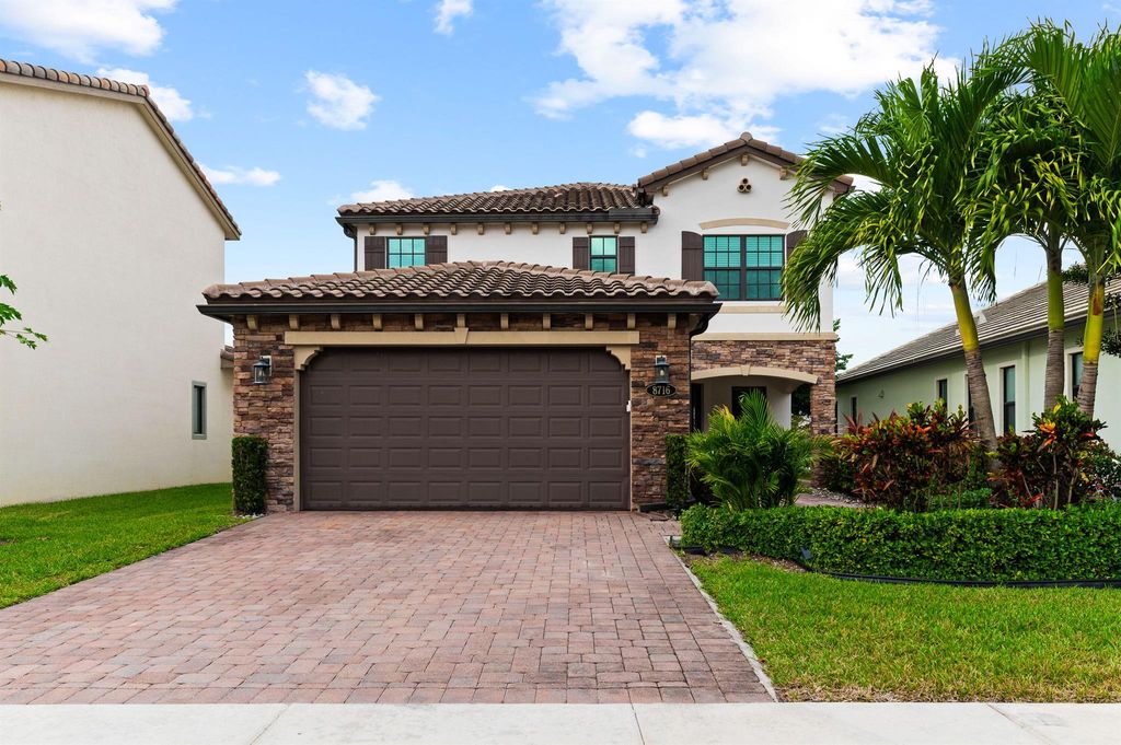 Photo of 8716 Grand Prix Lane, Boynton Beach, FL 33472 (MLS # R11148694)
