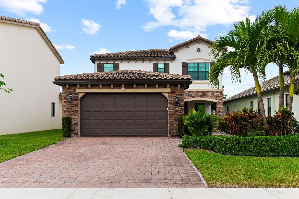 Photo of 8716 Grand Prix Lane, Boynton Beach, FL 33472 (MLS # R11148694)