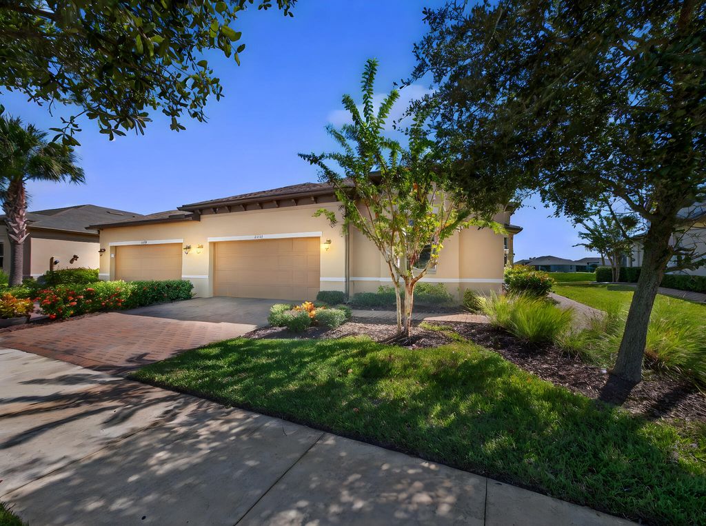 Photo of 11231 SW Winding Lakes Circle, Port Saint Lucie, FL 34987 (MLS # R11133326)