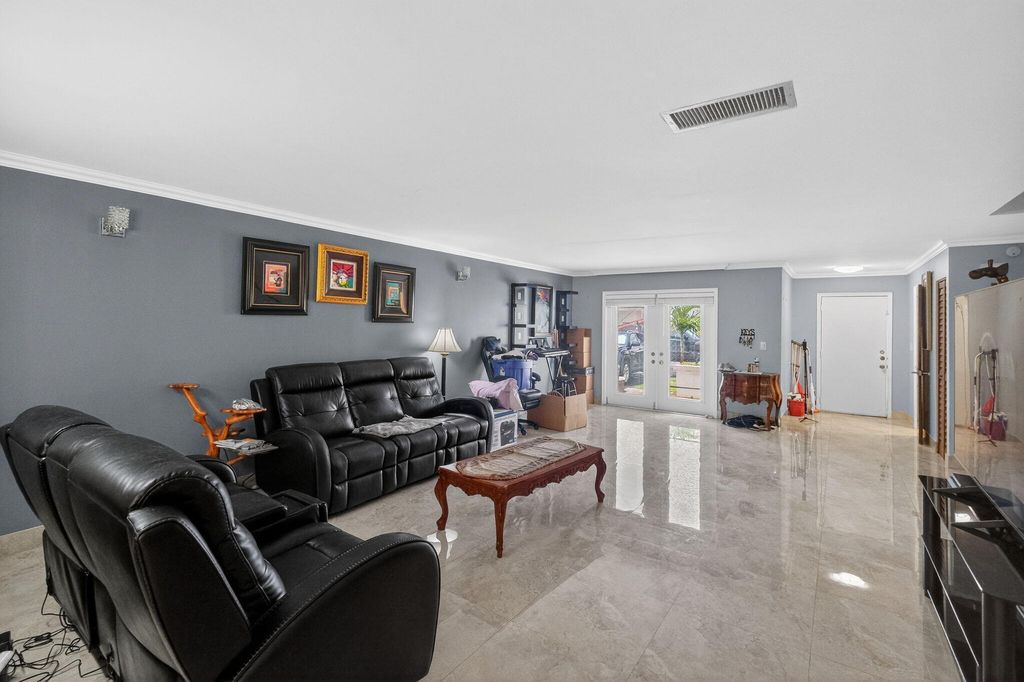 Photo of 928 NE 27th Avenue, Hallandale Beach, FL 33009 (MLS # B26011543)