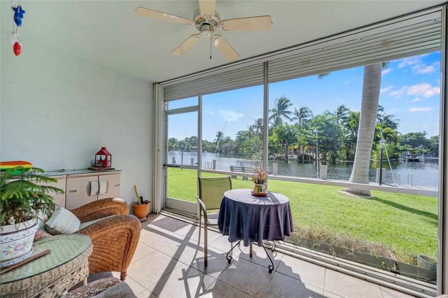 COVETED Front Row Seat... Direct River view right at the bend of the Middle River. Watch the boats go by from your spacious screened porch.  Walk right out to the sprawling lawn and dock.  Corner unit with abundance of light. All windows have accordion shutters for complete storm coverage. Spacious 2 bedroom 2 bath has been lovingly maintained. Awaits your touches.  BUILDING HAD ITS 50 YEAR INSPECTION IN 2022 (Report Available). Seller unaware of any pending assessments.  Community pool and tennis right out your door.  Convenient Parking space right at the front door.  Rare opportunity for a corner first floor residence. Square footage from Broward County Property Appraiser Buyer needs to confirm.