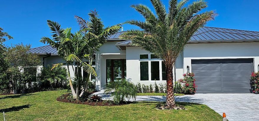 Brand New Build. PRIME LOT.132 Ft water frontage on the Canal. Extra large lot 13,732 SQ FT.  One house from the Intracoastal. Very close to the Hillsboro Inlet. New Dock ready for your Big BOAT.House ready in a few weeks. New Custom Built home, split floor plan, Built in Custom Bar with lounge area, Large Kitchen, Butlers Kitchen, Office space. Outdoor Lania with pool and hot tub overlooking the water. Ready for move in with many great features.