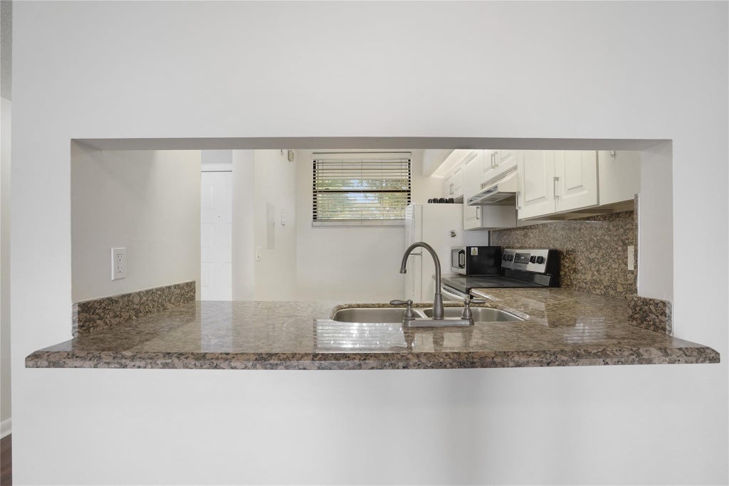 Photo of 109 Lake Emerald Drive #110, Oakland Park, FL 33309 (MLS # B26070580)