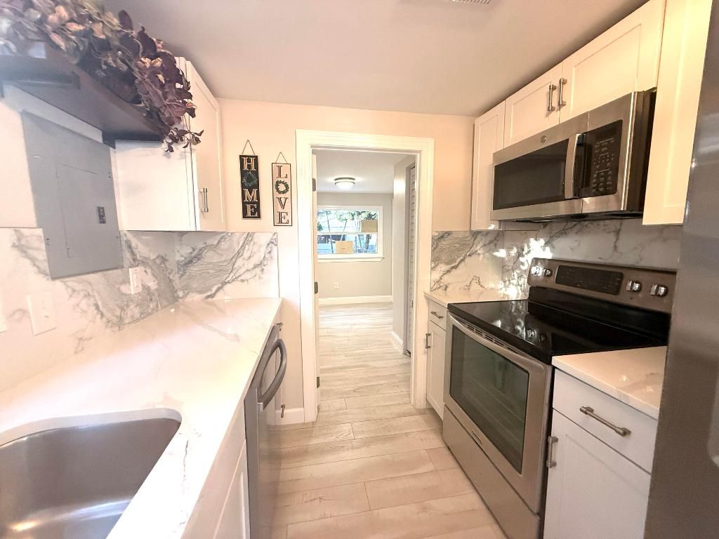 Photo of 1093 Highview Road, Lantana, FL 33462 (MLS # R11142528)