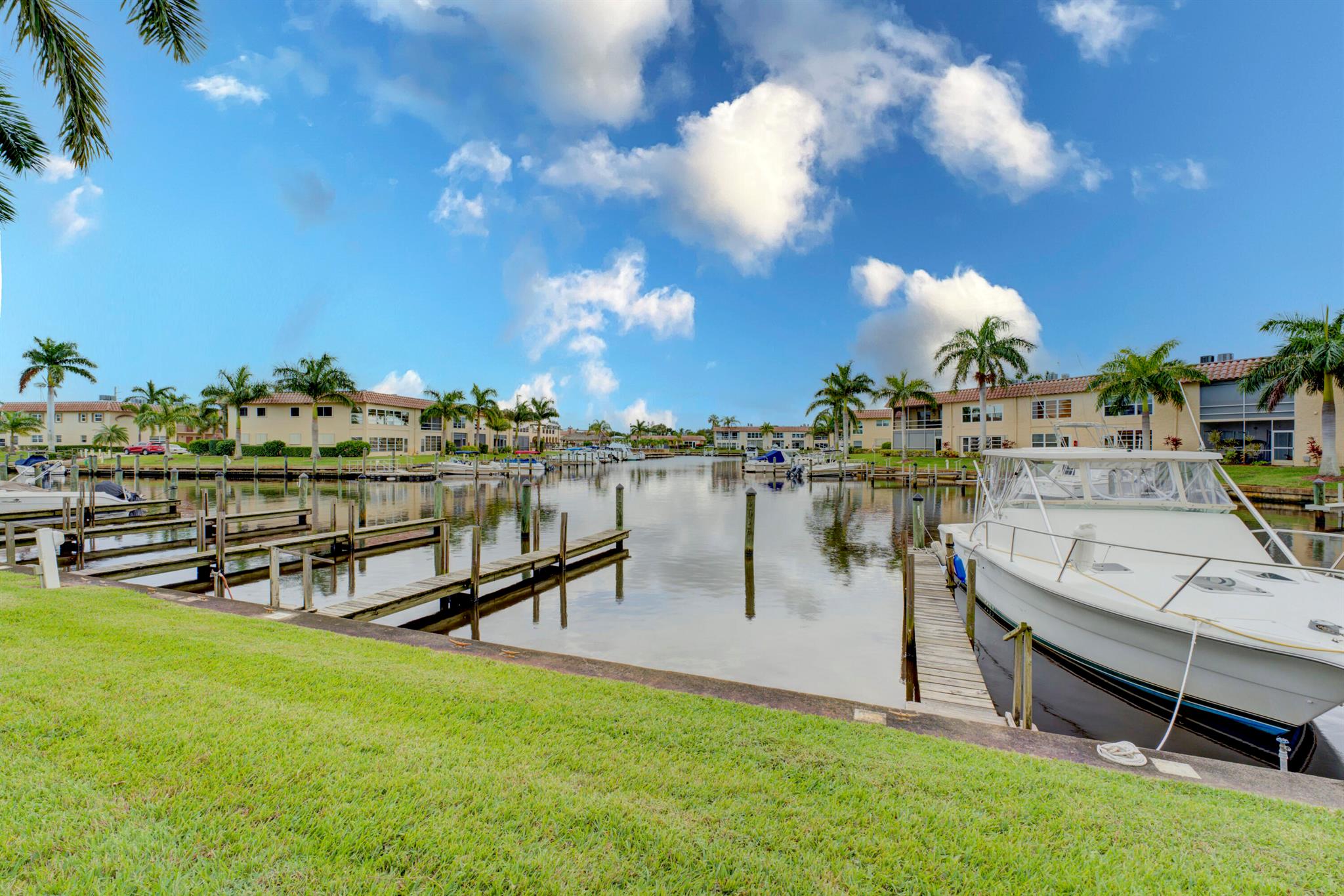 This 2nd floor condo has a beautiful view of the marina. Dock your boat, max 32' length & 11' wide, right behind your condo! Luxury vinyl floors (no carpet), updated kitchen, move-in ready. The complex has a wonderful central locatiion close to shopping, dining, golf & more. This waterfront active 55+ boating community offers amenities including a pool, marina, yacht clun & a variety of clubs & activities. Condo Association is self-governied & residents enjoy a low-maintenance lifestyle. Close to quaint downtown Stuart, 40 minutes north of Palm Beach International Airport. Stuart, known as the ''Sailfish Capital of the World,'' is located along Florida's renowned Treasure Coast, north of Palm Beach and south of Vero Beach. Great opportunity to own your little piece of paradise.