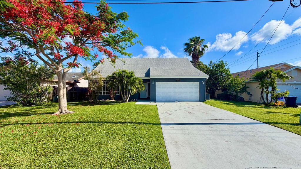 Photo of 6048 Garrett Street, Jupiter, FL 33458 (MLS # B26032136)