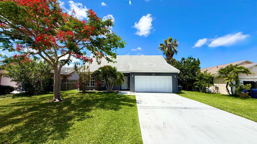 Photo of 6048 Garrett Street, Jupiter, FL 33458 (MLS # B26032136)