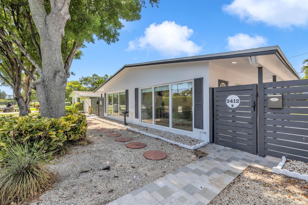 Photo of 2412 NE 4th Street #W, Pompano Beach, FL 33062 (MLS # B26028404)