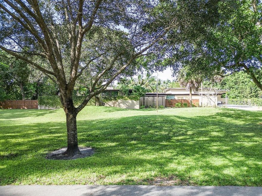 Our home is actually 2 homes. 
3 bedrooms / 5 bathrooms in the Main home and 
2 bedrooms / 2 bathroom Guest home. 
The homes are connected only by the garage. 
5575 total square feet, on one acre lot.
The property features a resort style back yard complete with a heated pool. Outdoor kitchen areas on both patios. An Oasis awaits you.
Propane generator is on the property, with a 1000 gallon sunken propane tank.  All impact windows have been installed. The property also has a safe room in case of severe storm.
Extensive landscaping has been installed with native Florida plants to attract butterflies and hummingbirds. 
The original home, has been updated with new fixtures, with the same footprint to keep with the Frank Lloyd Wright / mid century modern style of the home.