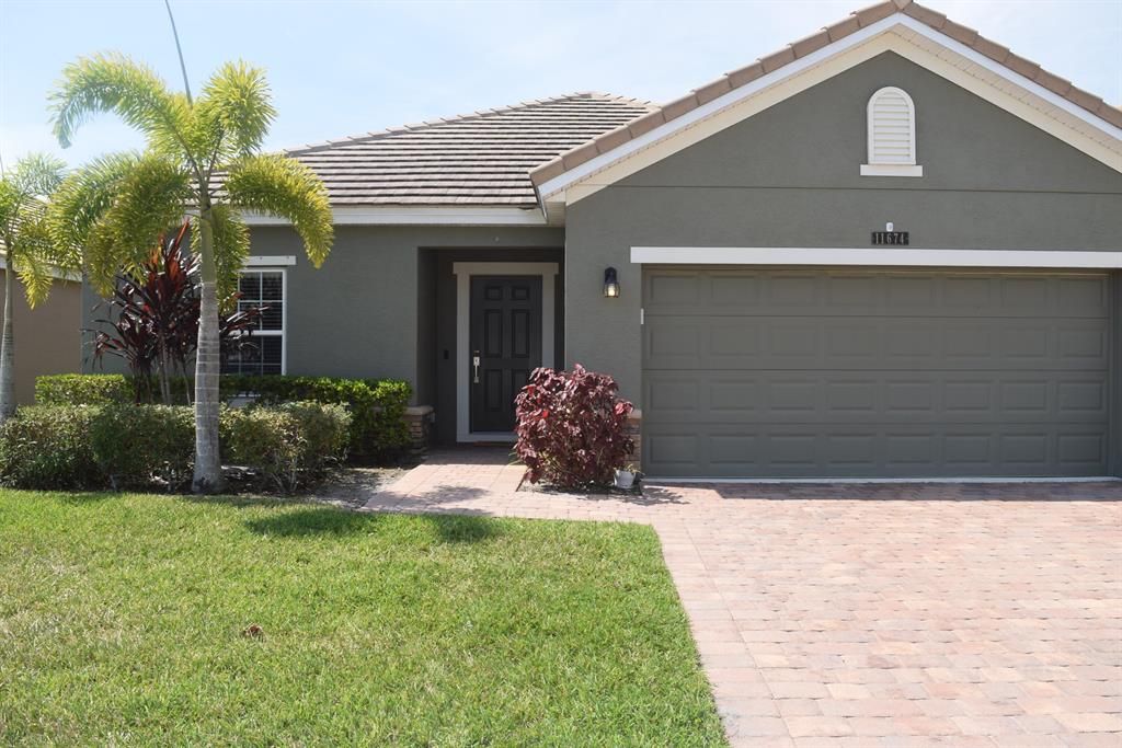 Photo of 11674 SW Rowena Street, Port Saint Lucie, FL 34987 (MLS # R10874862)