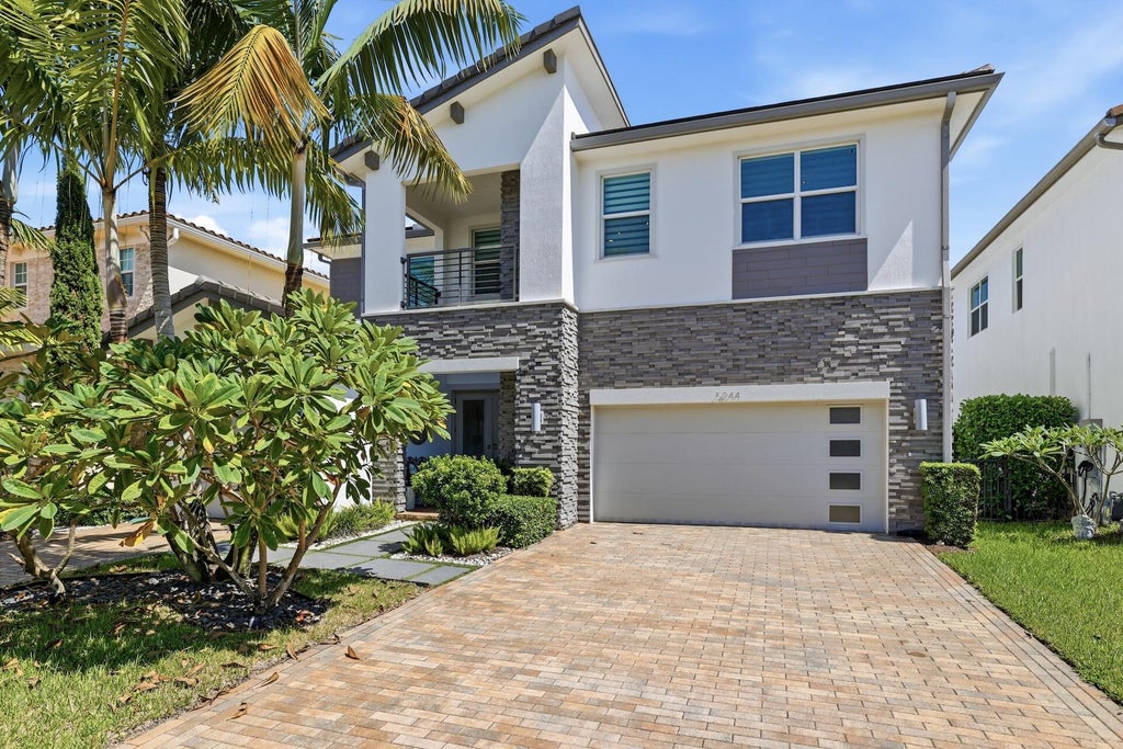 Photo of 5244 Beland Drive, Lake Worth, FL 33467 (MLS # B26085690)