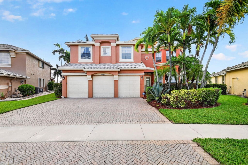 Photo of 2279 Ridgewood Circle, Royal Palm Beach, FL 33411 (MLS # B26057899)
