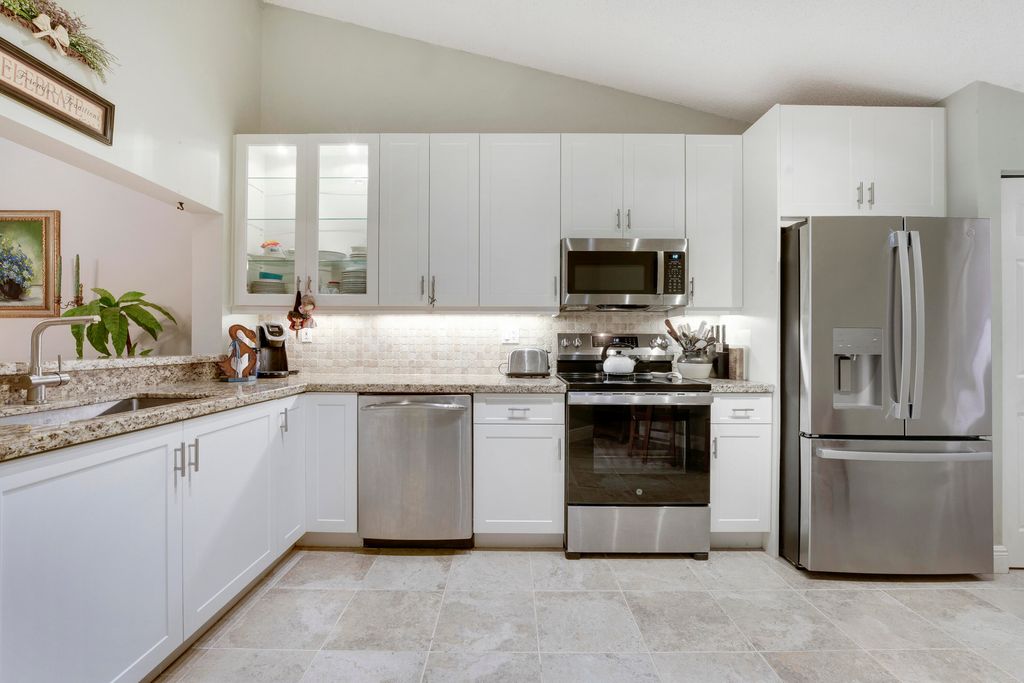Photo of 479 Ashwood Place, Boca Raton, FL 33431 (MLS # R11119767)