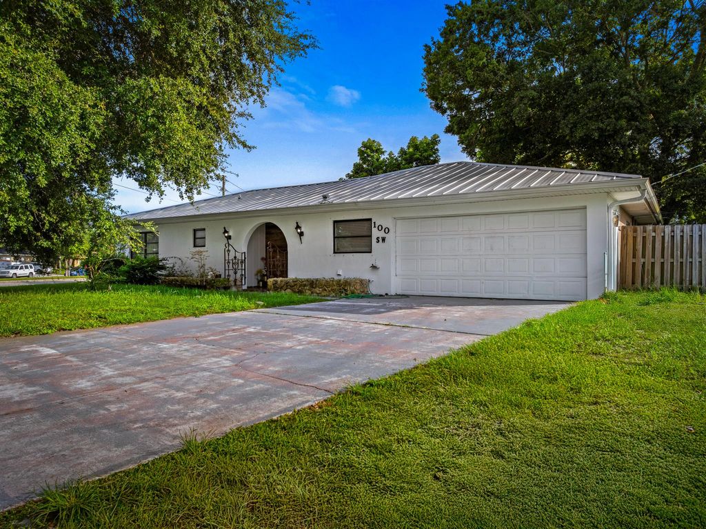 Photo of 100 SW Lakehurst Drive, Port Saint Lucie, FL 34983 (MLS # R11125619)