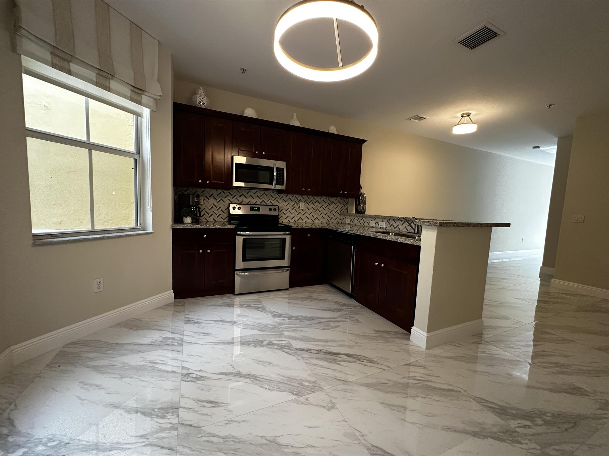 SHOMA TOWNHOMES AT ROYAL PALM BEACH CONDOMINIUM - Residential