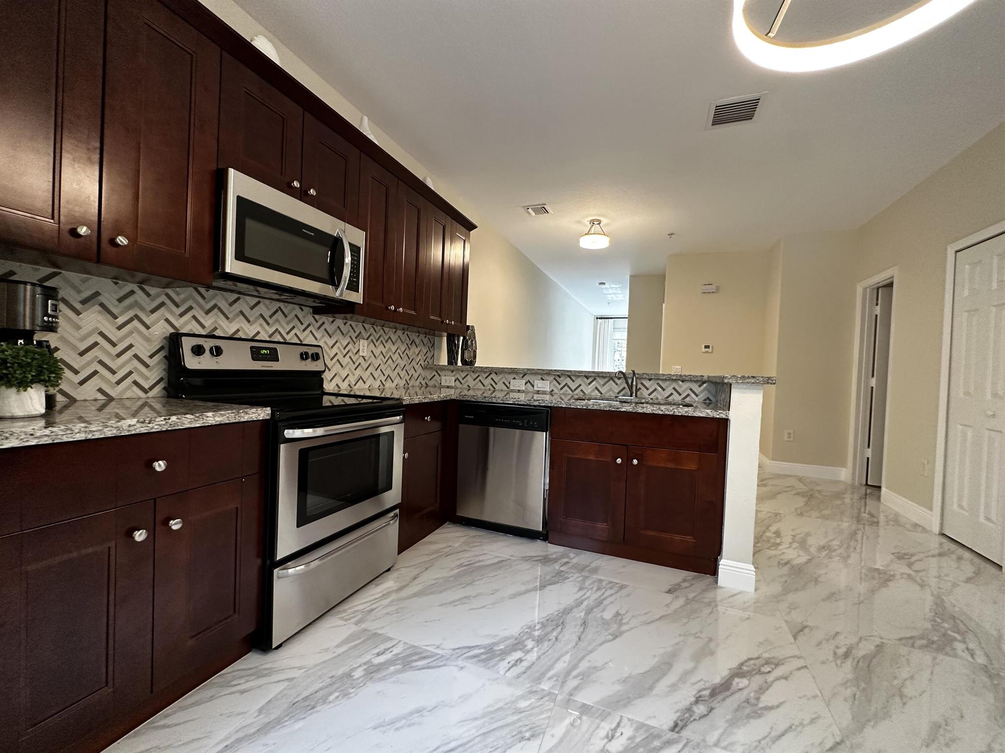 SHOMA TOWNHOMES AT ROYAL PALM BEACH CONDOMINIUM - Residential