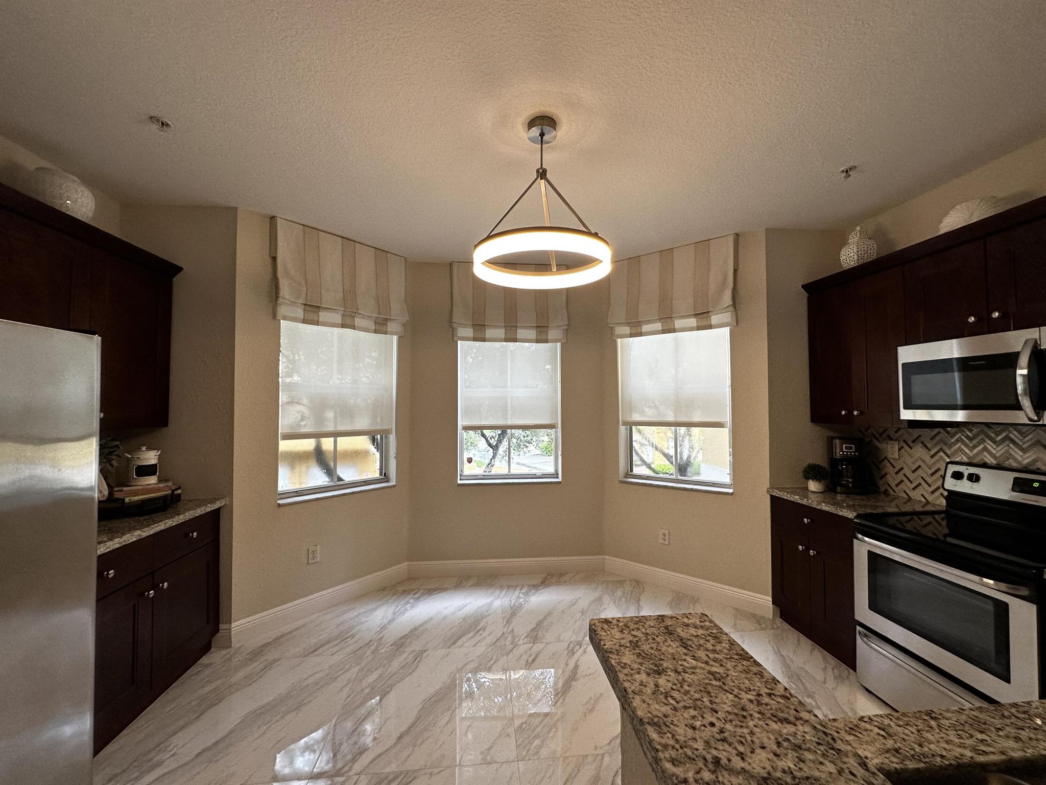 SHOMA TOWNHOMES AT ROYAL PALM BEACH CONDOMINIUM - Residential