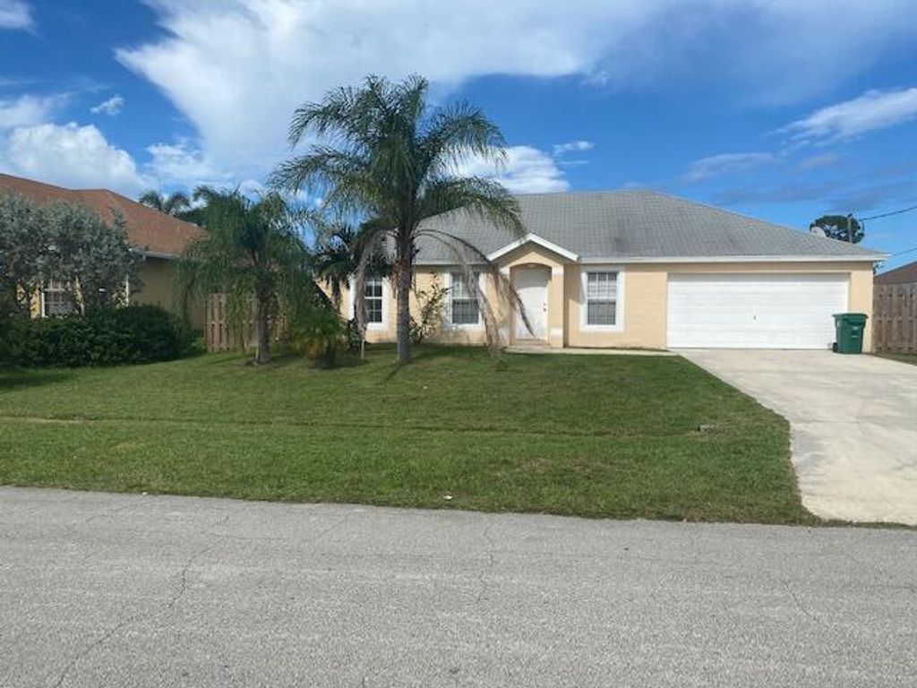 Photo of 2025 SE Mantua Street, Port Saint Lucie, FL 34952 (MLS # R10738120)