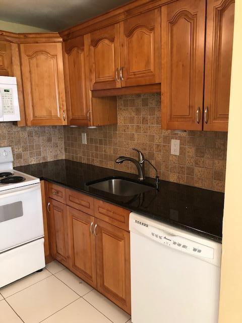 Beautifully remodeled first floor 1/1 condo with golf view from the living room. The kitchen has new cabinets with granite countertops. Master bath has walk in shower with waterfall mosaic tile. There is a newer ac and water heater. Full size washer dryer is located in the patio closet. 55+ CommunityAvailable July 1, 2019