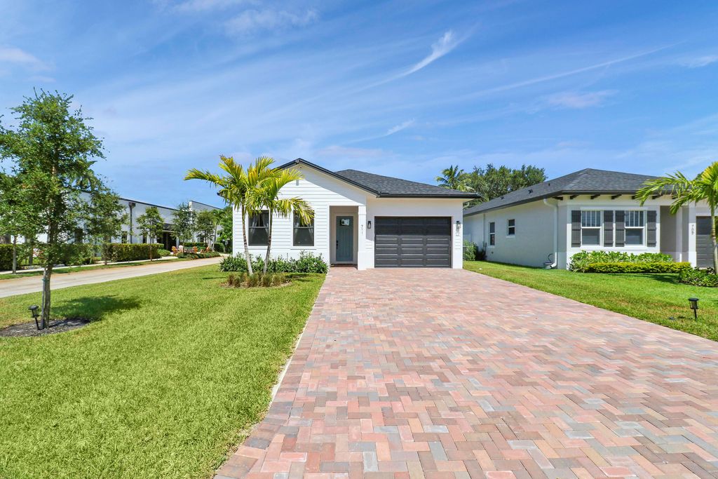 Photo of 711 N Perry Avenue, Jupiter, FL 33458 (MLS # R11009189)