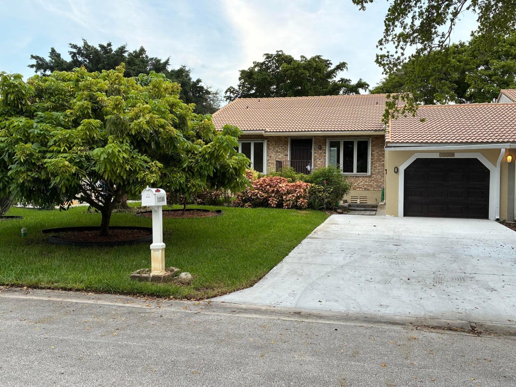 Photo of 11560 NW 23RD Street NW #E, Coral Springs, FL 33065 (MLS # B26089150)