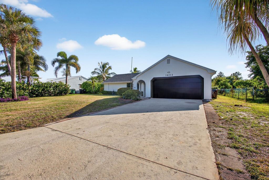 Photo of 1402 SE Buckingham Terrace, Port Saint Lucie, FL 34952 (MLS # R11111130)