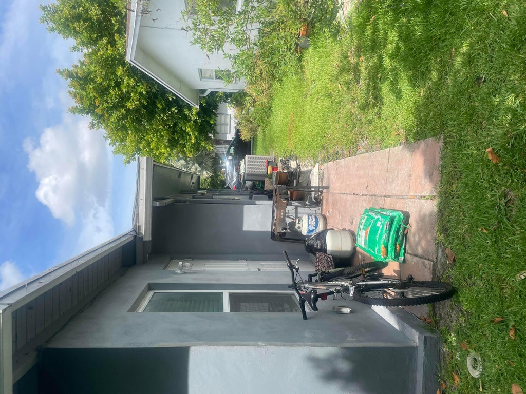 Photo of 5706 NW 68th Is Terrace, Tamarac, FL 33321 (MLS # B26042775)