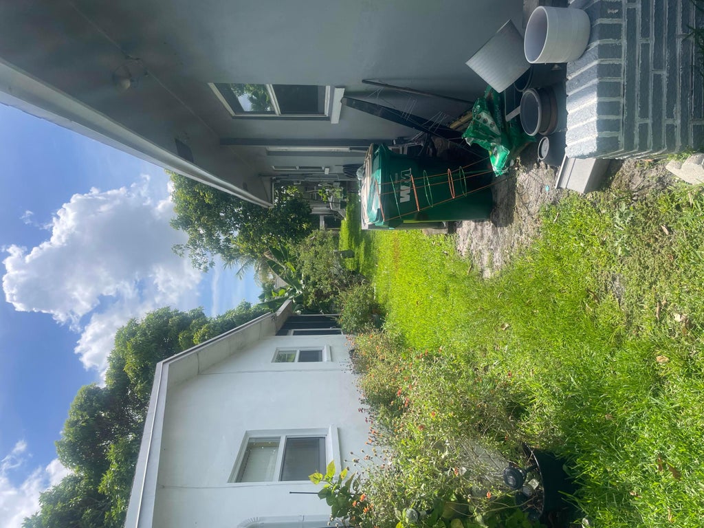 Photo of 5706 NW 68th Is Terrace, Tamarac, FL 33321 (MLS # B26042775)