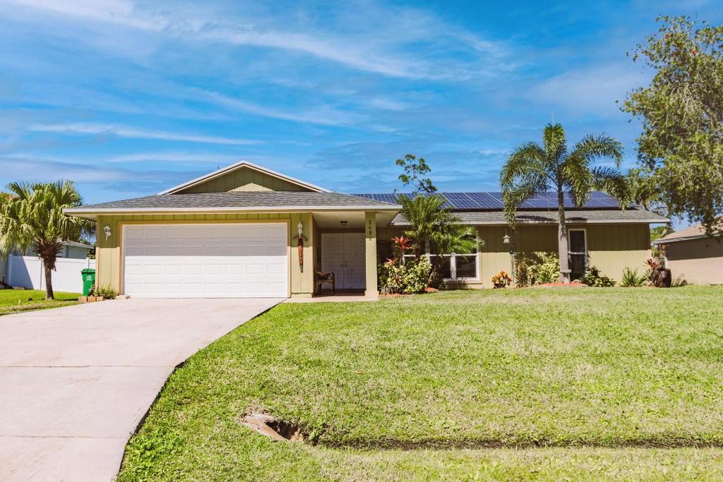 Photo of 2484 SW Falcon Circle, Port Saint Lucie, FL 34953 (MLS # R10958613)