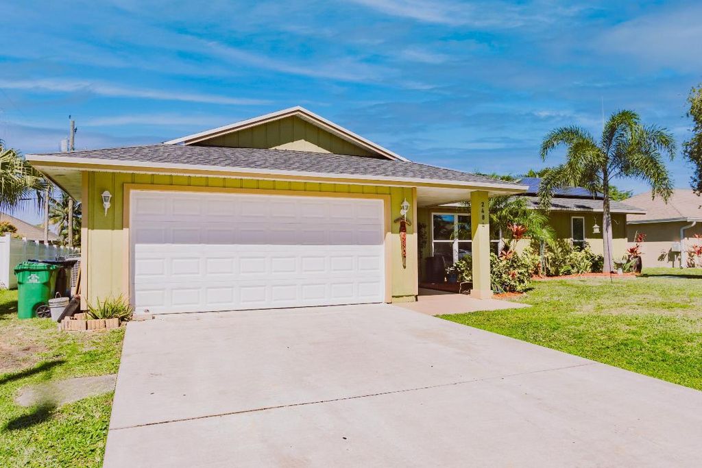 Photo of 2484 SW Falcon Circle, Port Saint Lucie, FL 34953 (MLS # R10958613)