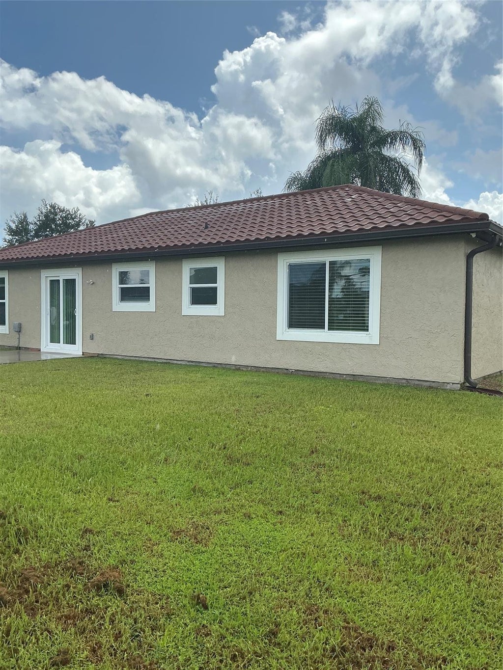 Photo of 1487 SW Leisure Lane, Port Saint Lucie, FL 34953 (MLS # F10525136)