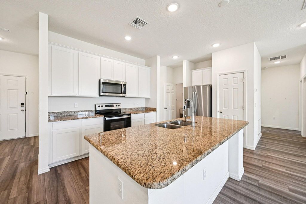 Photo of 1626 SW Neptune Avenue, Port Saint Lucie, FL 34953 (MLS # R11159353)