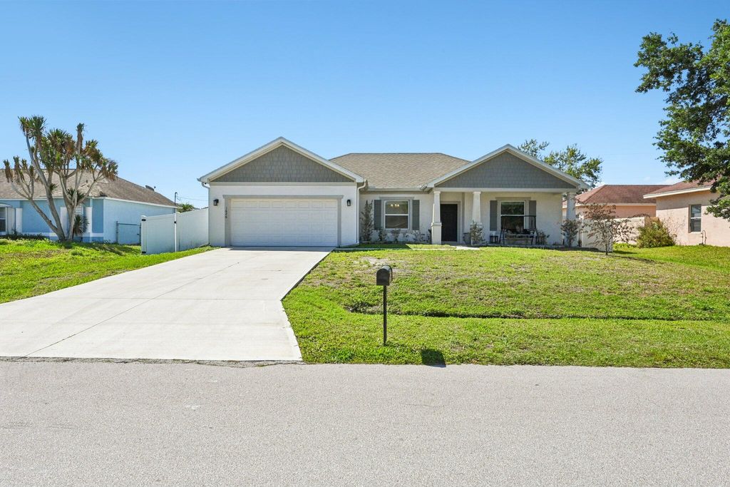 Photo of 1626 SW Neptune Avenue, Port Saint Lucie, FL 34953 (MLS # R11159353)