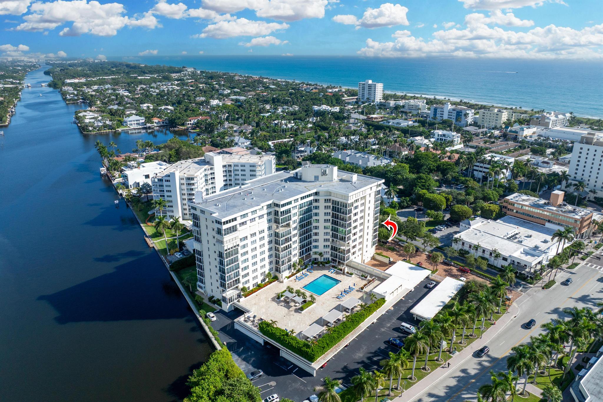 Spacious 2-bedroom, 2-bath corner unit is one of the largest units available in this full-service building in desirable Delray Beach. This southeast-facing condo enjoys bright morning light and city views from an oversized, fully enclosed 19' x 11' balcony overlooking the water. This unit features hurricane-impact windows, in-unit washer and dryer, and a brand-new A/C system. The open layout includes a formal dining area and a modern eat-in kitchen with recessed lighting, custom wood cabinetry, stainless steel appliances, and granite countertops. The split-bedroom floor plan provides privacy, with the primary suite and second bath both offering walk-in showers.