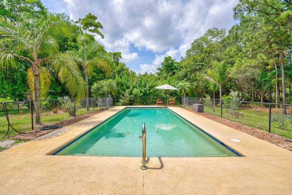 Photo of 12857 N 152nd Street N, Jupiter, FL 33478 (MLS # R10972719)