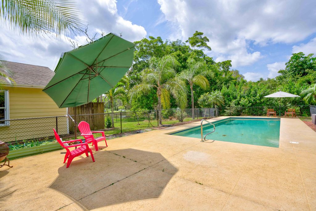 Photo of 12857 N 152nd Street N, Jupiter, FL 33478 (MLS # R10972719)