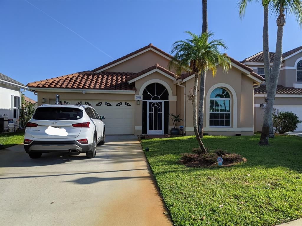 Photo of 7182 Charleston Point Drive Dr, Lake Worth Beach, FL 33467 (MLS # R10714448)