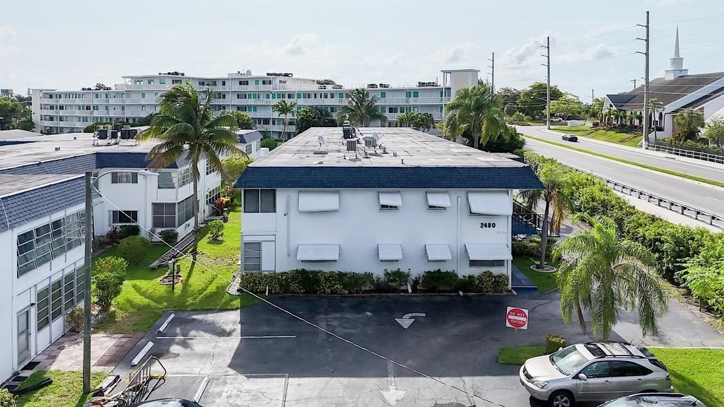 Photo of 2480 Lake Osborne Drive #104, Lake Worth Beach, FL 33461 (MLS # R11096398)