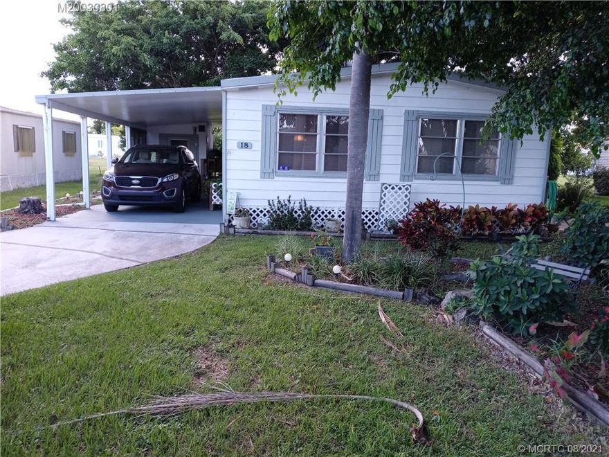 Turnkey 2-bed, 2-bath home in Spanish Lakes Golf Village! This spacious 1,170 sq. ft. residence features an open living area, Florida room, and updated flooring. Enjoy a bright kitchen with ample storage, built-in shelving, and walk-in closets. Fully furnished and move-in ready with storm shutters, washer/dryer, and carport. Located on a quiet cul-de-sac with lagoon views. Community amenities include golf, pool, clubhouse, fitness center, and more. Affordable living with low taxes and land lease. Market rent (new owner): $943.57 a month. New Roof 2024 AC 6 years old