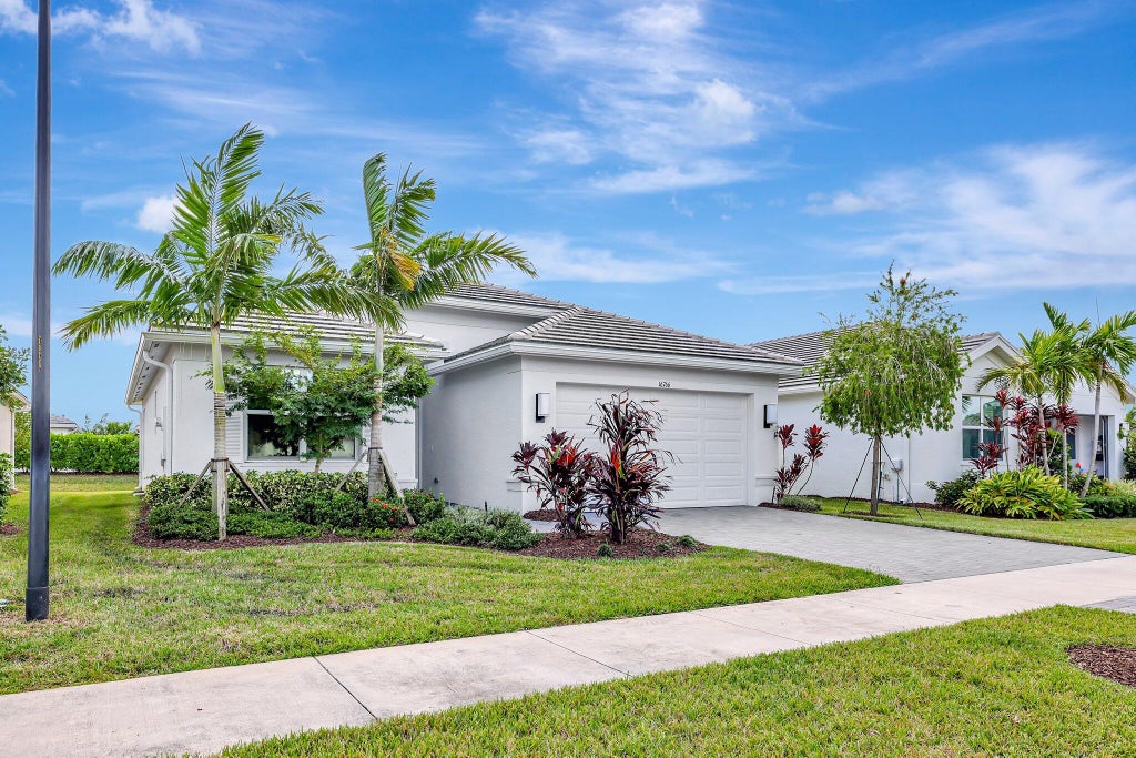Photo of 16766 SW Osprey Falls Way, Port Saint Lucie, FL 34987 (MLS # R11035290)