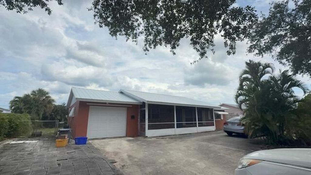 Photo of 928 Prosperity Farms Road, North Palm Beach, FL 33408 (MLS # B26029527)
