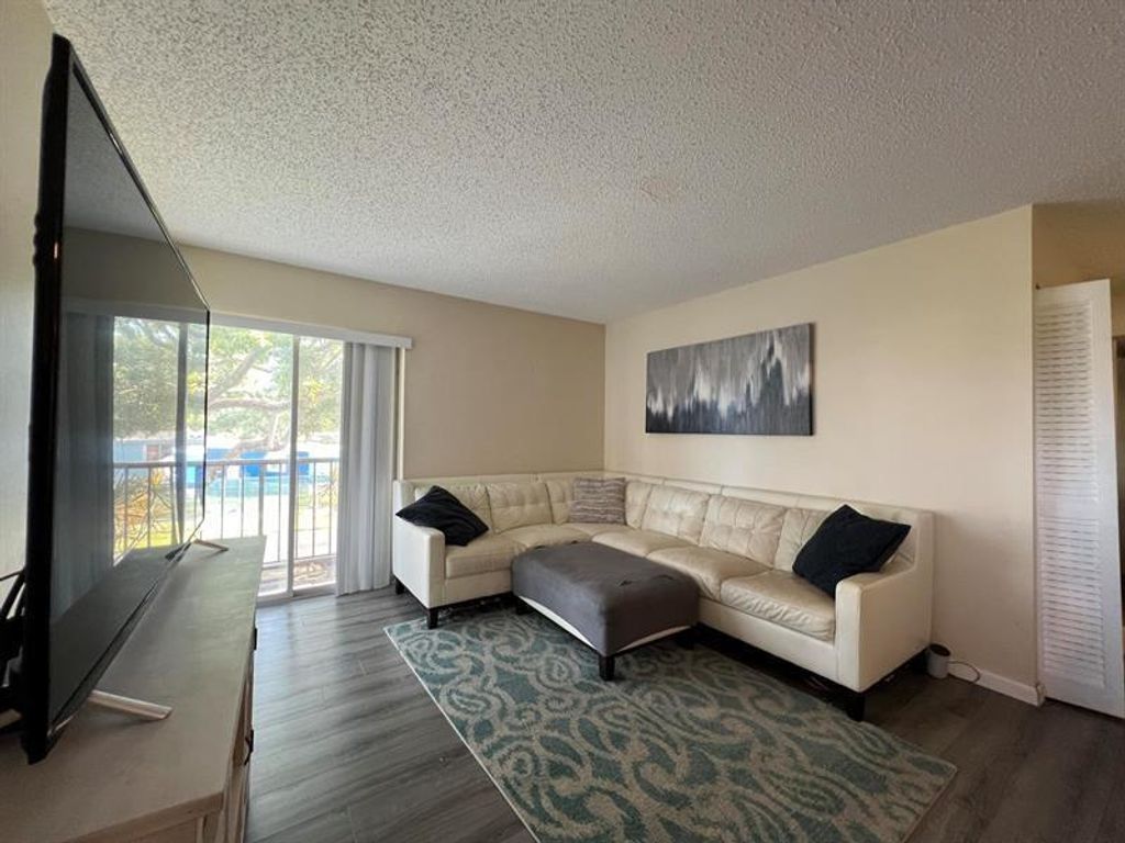Photo of 1807 Fairview Villas Drive #3, Palm Springs, FL 33406 (MLS # B26009536)