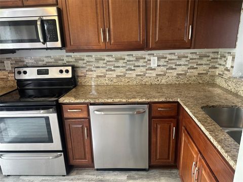 Tiny photo for 3263 NW 44th Street #6, Oakland Park, FL 33309 (MLS # F10515817)