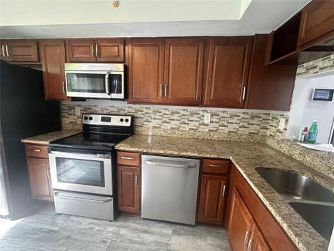 Tiny photo for 3263 NW 44th Street #6, Oakland Park, FL 33309 (MLS # F10515817)
