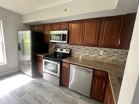 Tiny photo for 3263 NW 44th Street #6, Oakland Park, FL 33309 (MLS # F10515817)